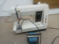 Singer Automatic sewing machine with adapter