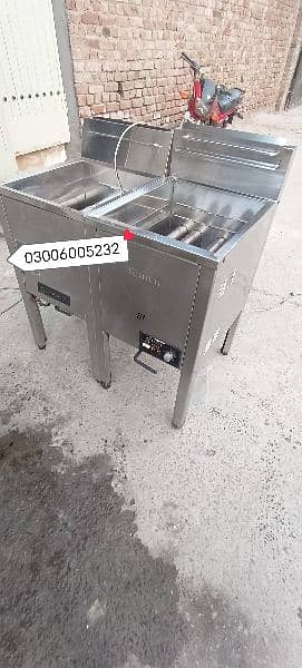 pizza oven deep fryer dough mixer counter fast food restaurant. . 1