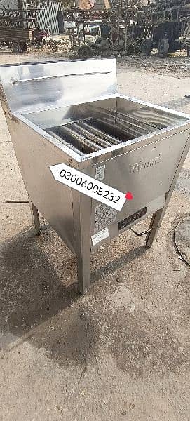 pizza oven deep fryer dough mixer counter fast food restaurant. . 4