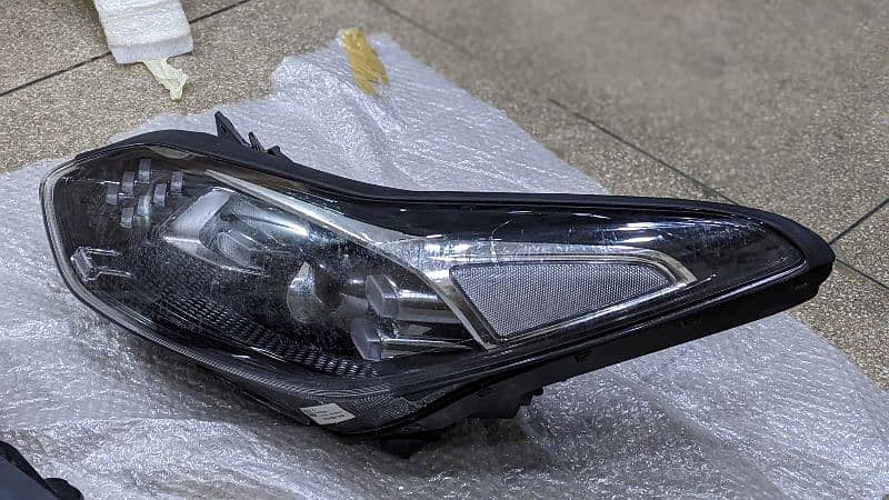 Kia Sportage Genuine Head lights with fitted blaster in the light assy 5
