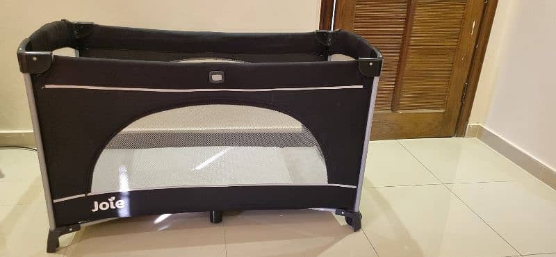 joie travel cot 0