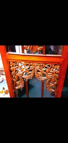 teakwood  showcase  with carving 3