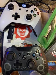 Xbox One S with two controllers and cds and games installed