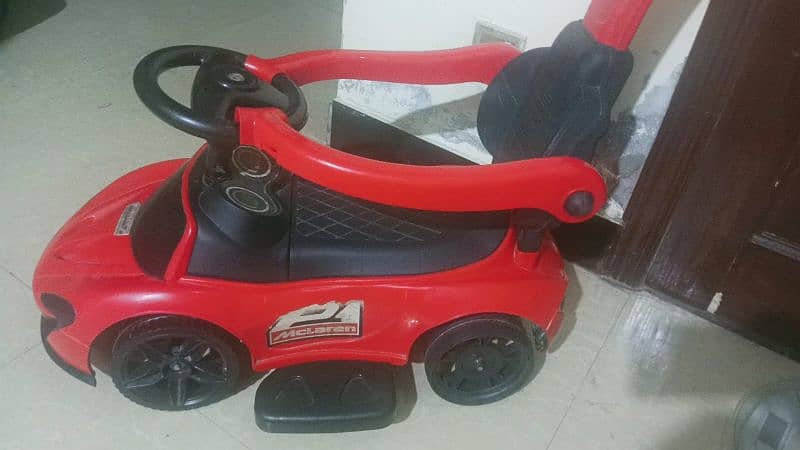 kids car with 2 extra wheels. in good condition 2
