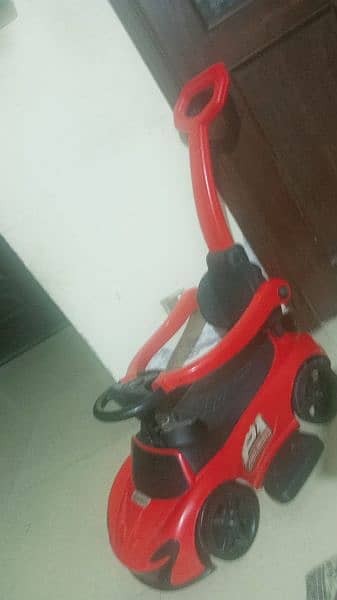kids car with 2 extra wheels. in good condition 4
