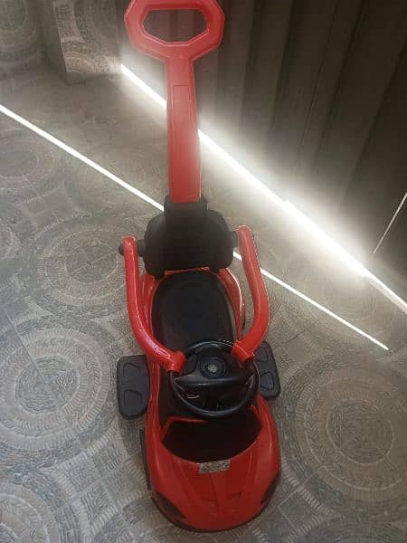 kids car with 2 extra wheels. in good condition 9