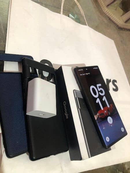 Google Pixel 6 pro 12/128gb,box and charger and 2 case 1