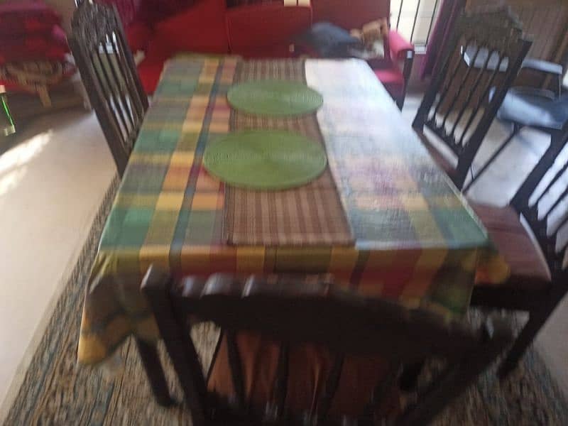 four chairs and a table 3