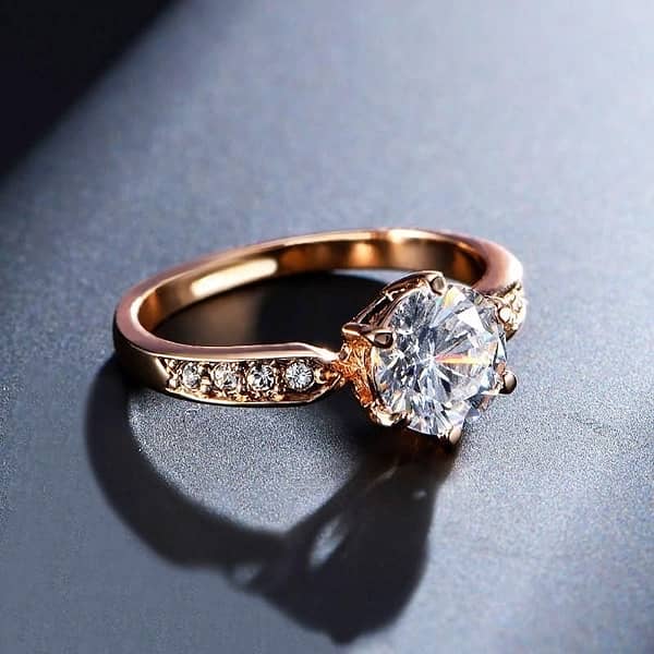 "Sparkling Elegance: Zircon Adorned Sterling Gold Ring" 1