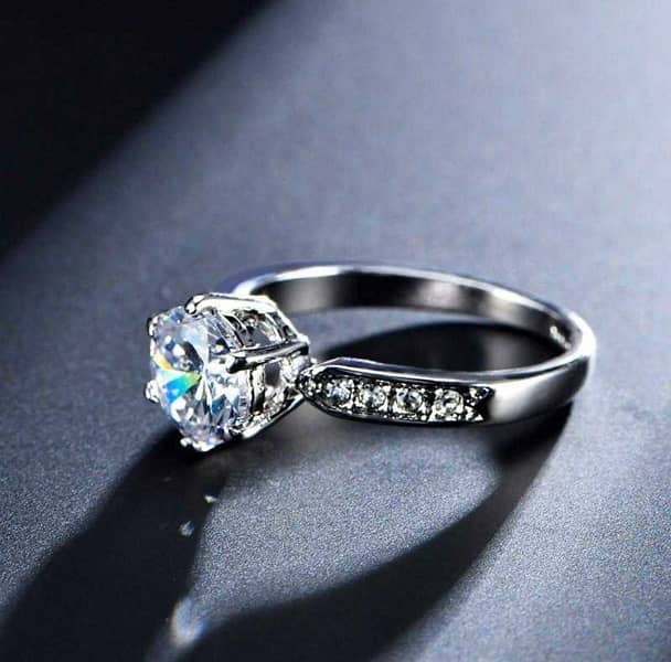 "Sparkling Elegance: Zircon Adorned Sterling Gold Ring" 3