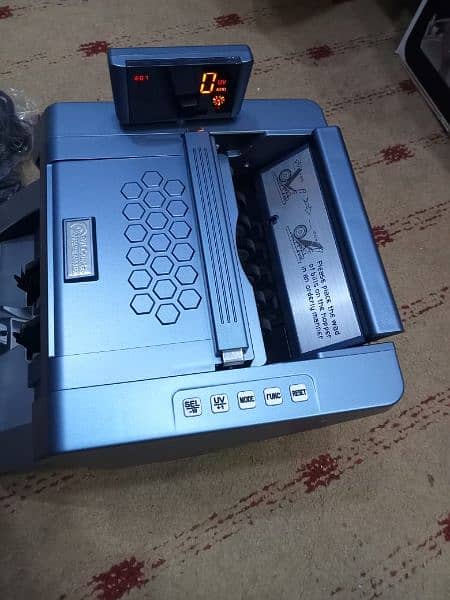 Cash currency note counting machine in Pakistan with fake note detect 11