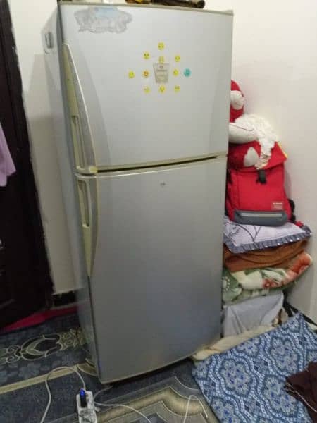 Used full outlet size refrigerator