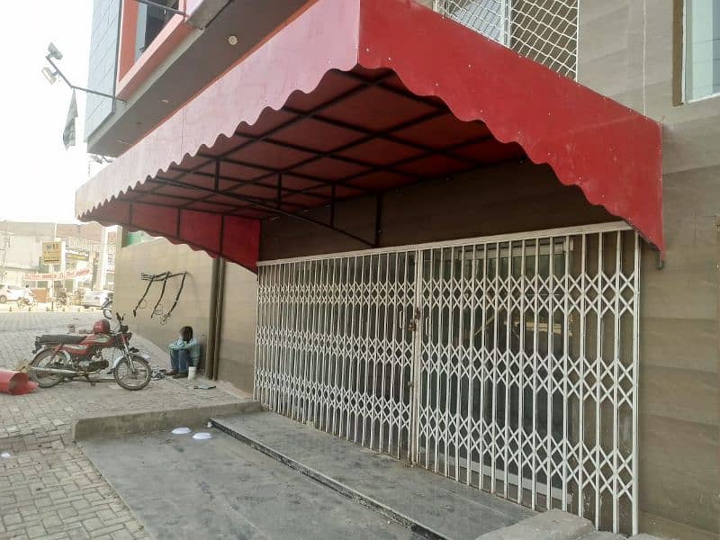 Fiberglass shade in Lahore with iron stracture /door gate /grill 7