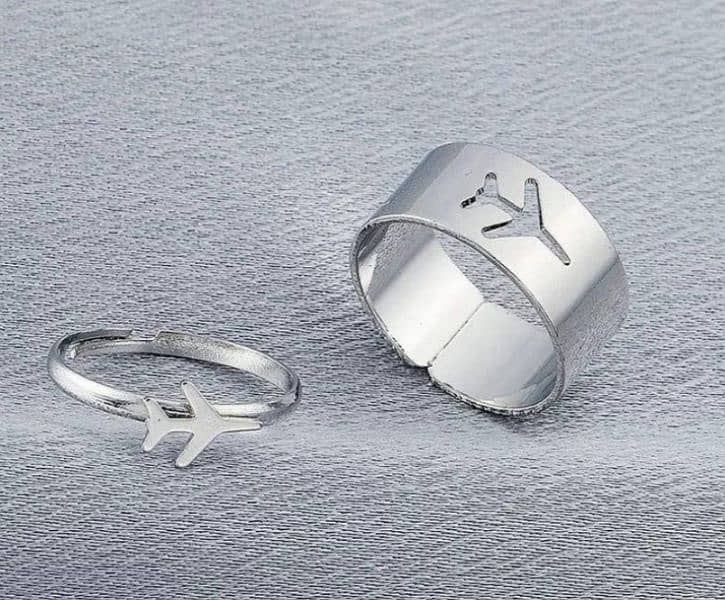 •  2 Pcs Couple Aeroplane Rings With Free Delivery all over Pakistan. 1