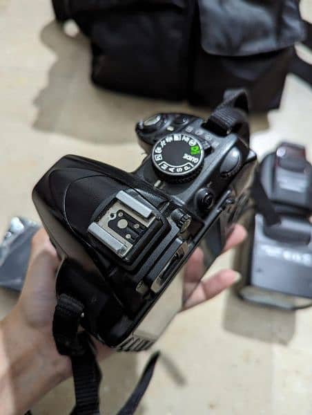 Nikon D3100 DSLR Camera with 18-55mm Auto Focus-S Nikkor Zoom Lens 7