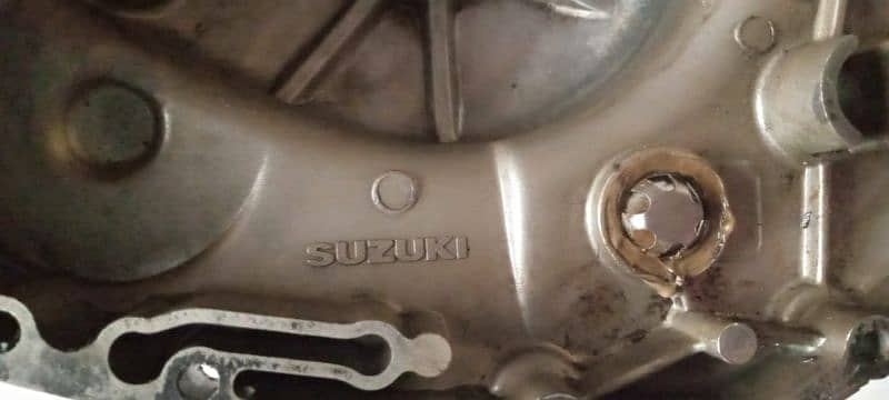 suzuki 150 clutch cover 4