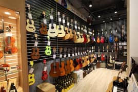 Acoustic bignners professhional guitars Violins Ukuelels Musical store