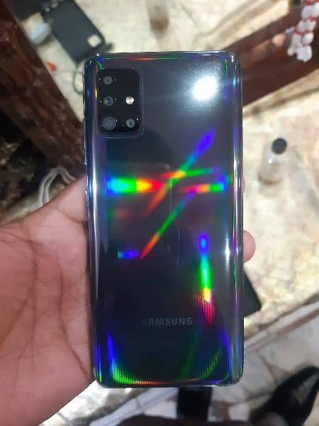 samsung A51 4+4  128GB with charger 1