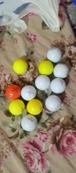 Golf Balls with other golf accessories. 4