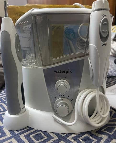 Waterpik water flosser, sonic toothbrush, oral irrigator, wp-950 1