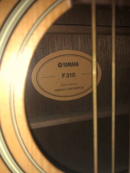 Yamaha f310 acoustic guitar 4
