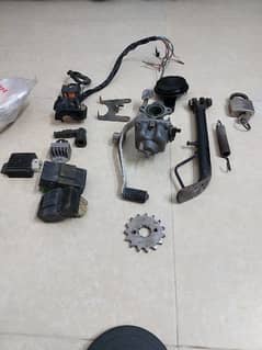 Honda 125 geniune parts carborator CDI system charger side stand 0