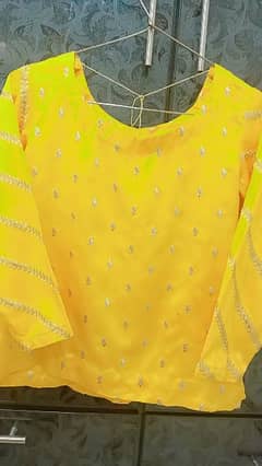 Yellow lehnga kurti or dupta its bridal mehndi dress. One time used