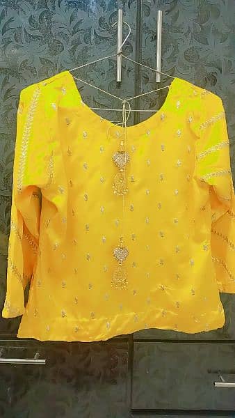 Yellow lehnga kurti or dupta its bridal mehndi dress. One time used 1