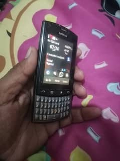 Nokia Asha 303 touch and type. . .