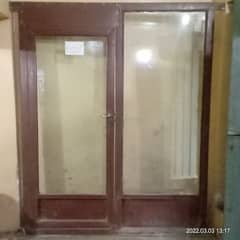 Glass door with iron frame for shop clinic saloon or office.