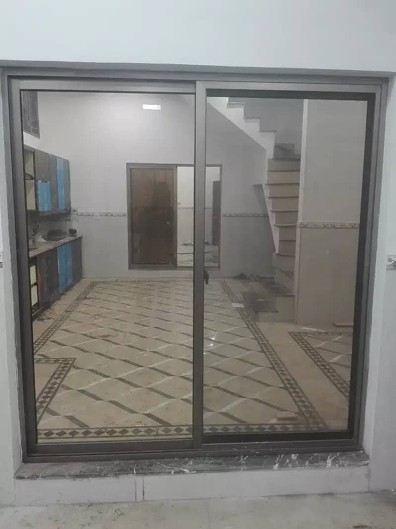 Aluminium windows and doors & 12 mm glass work 15