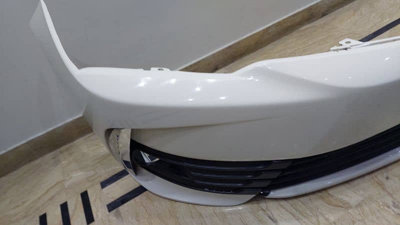 corolla gunian  front bumper for sale   white colour 1