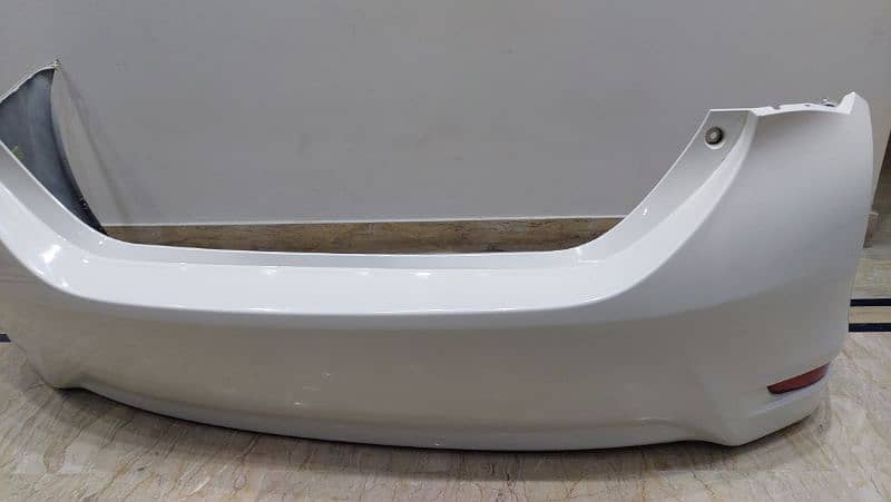 corolla gunian back bumper for sale white colour 3