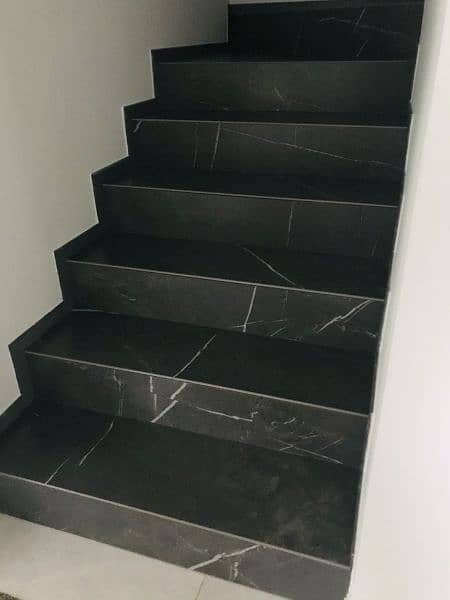 marble and granite for flooring , stairsteps, kitchen top, vanity 3