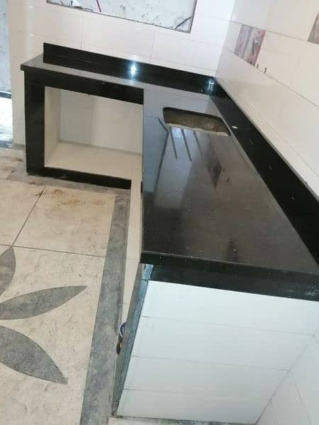 marble and granite for flooring , stairsteps, kitchen top, vanity 7