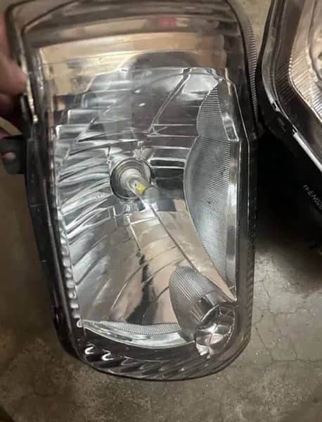 Mehran head lights pair with HID lights installed 0