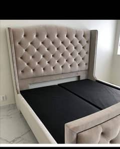 bed with 2 side tables and dressing