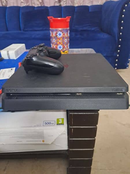 ps4 slim 500gb with two controllers and games 1