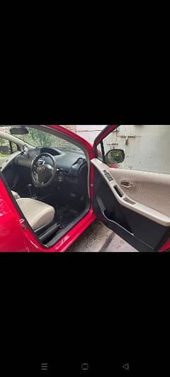 Toyota vitz red color.