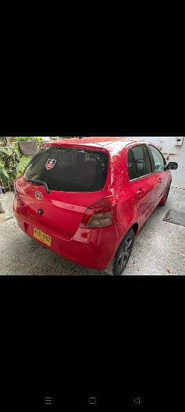 Toyota vitz red color. 1