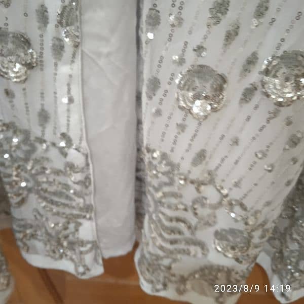 Beautiful white net gown with star work. Ready to wear. 9