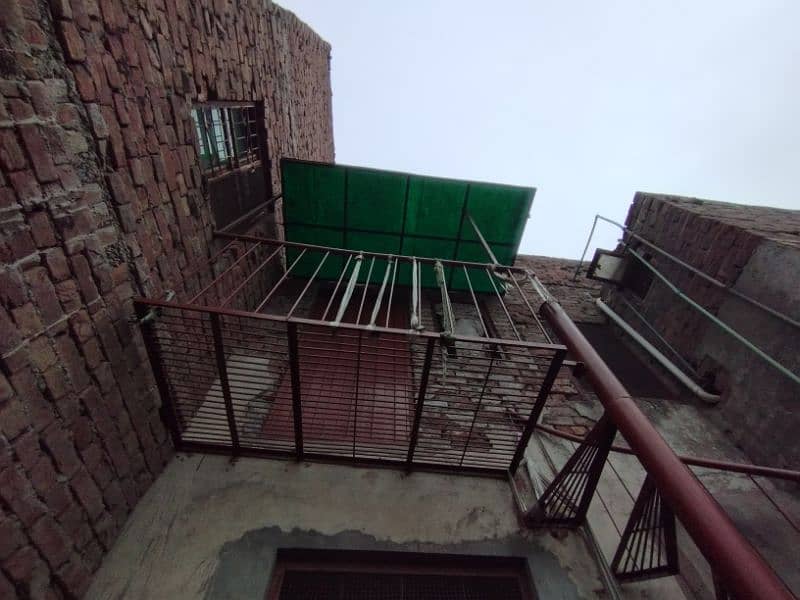 Spiral stairs with a fiber glass shed and iron floor 3