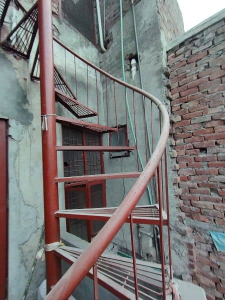 Spiral stairs with a fiber glass shed and iron floor 4