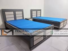 Stylish 2 single beds one side table