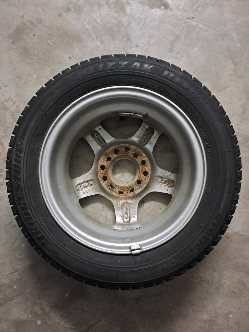 Japanese only 1 Original Alloy Wheel and 2 Tyres. 1