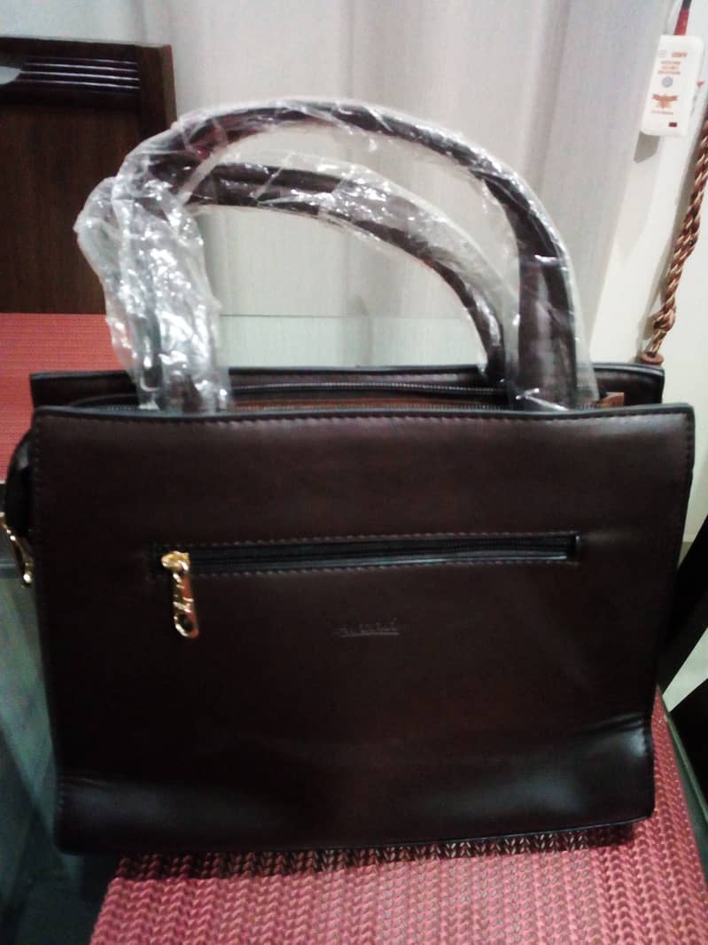 Imported leather mix HANDBANG with free gift . . . Dubai 1