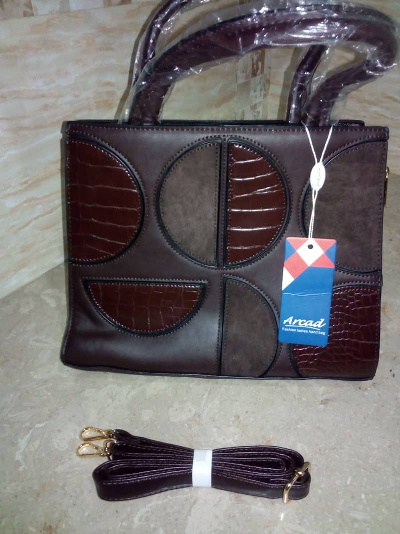 Imported leather mix HANDBANG with free gift . . . Dubai 5