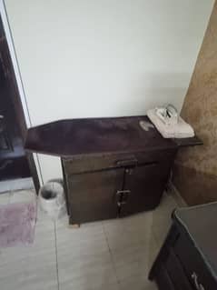 dressing table and iron stand. . .