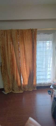 Almost new valvet curtains with Inner in golden brown colour.