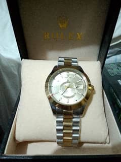 Rolex watch chronograph, golden & Silver, automatic